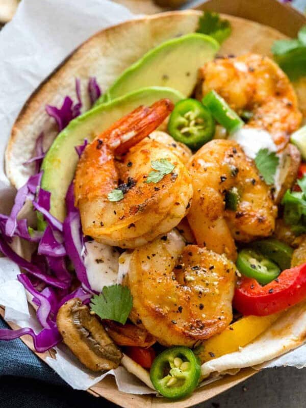 Spicy shrimp fajitas wrapped in a flour tortilla