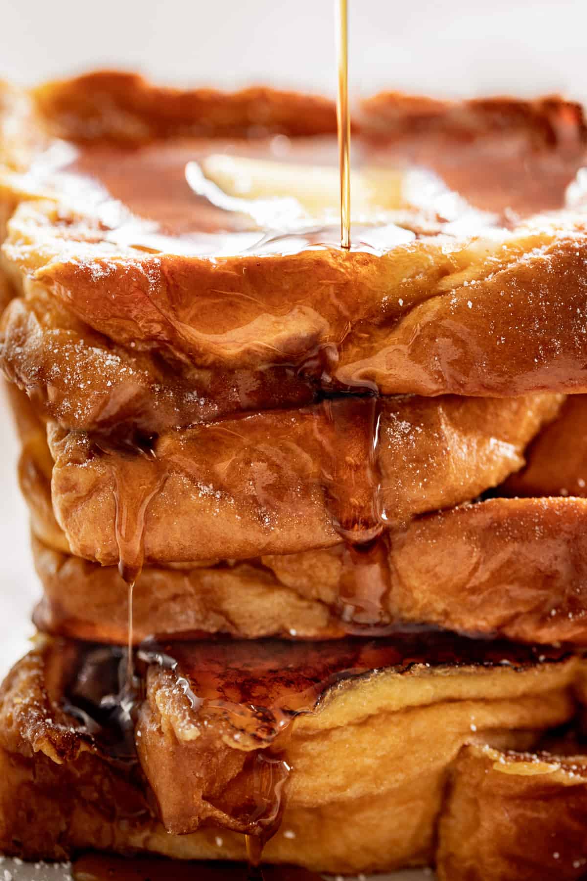 The Best French Toast drizzled with maple syrup