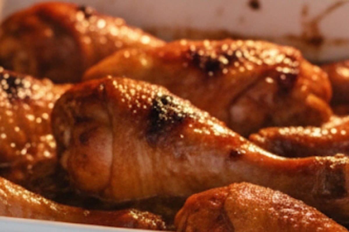 Switch the oven to broil on medium heat, uncover the chicken, and broil until the tops are golden brown.
