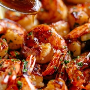 Pouring sauce on shrimp