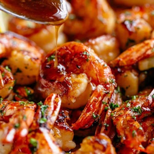 Seared Honey Garlic Butter Shrimp coated in the best honey garlic butter sauce is a quick  Honey Garlic Butter Shrimp