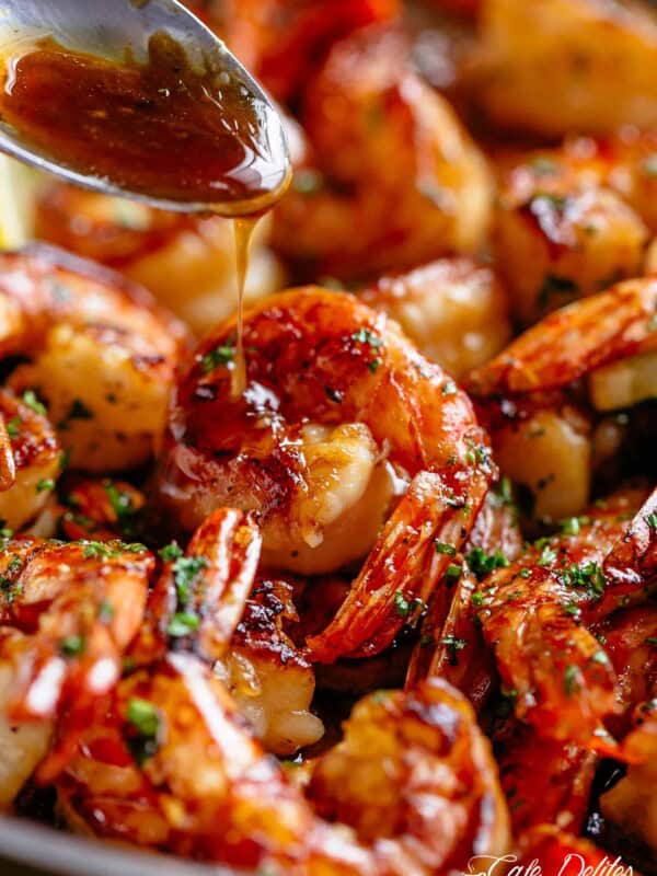 Pouring sauce on shrimp