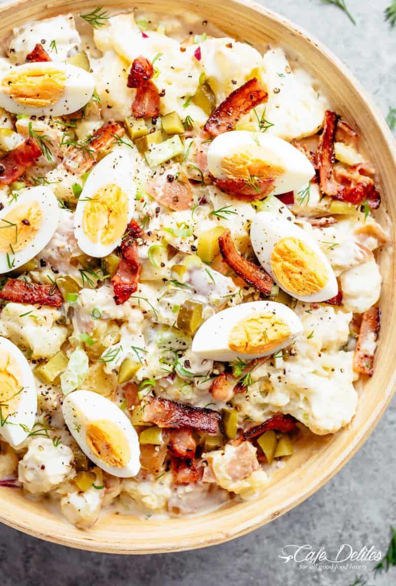Potato Salad with Bacon, Dill Pickles, Eggs, HALF the carbs AND a creamy mayo/sour cream dressing! This Potato Salad is THE BEST side dish! HALF of the carbs of regular potato salads with SO MUCH FLAVOUR! The recipe also includes LOW CARB AND ALL CARB OPTIONS! | cafedelites.com