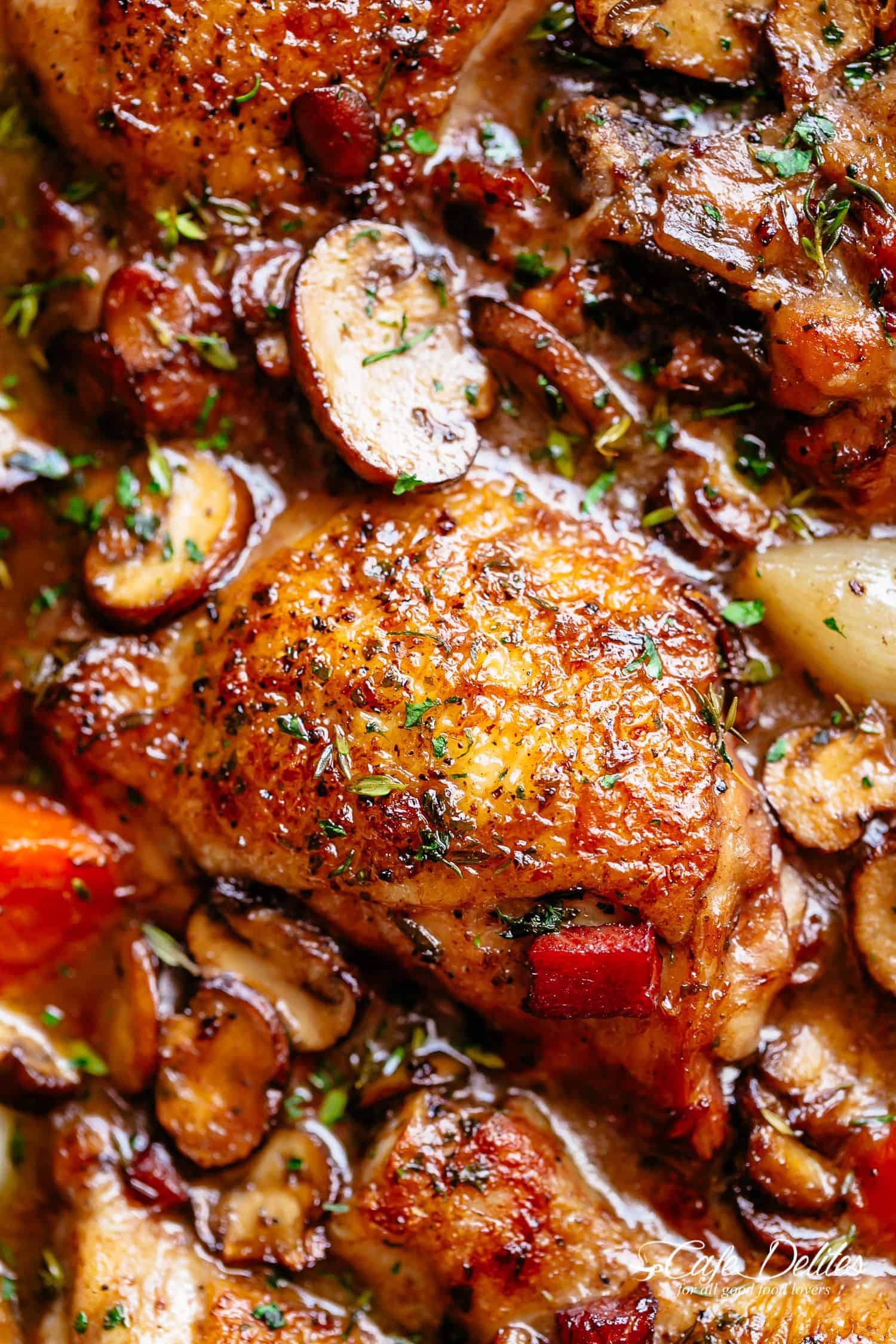 Coq Au Vin, or chicken in wine, is a popular classic French Chicken Stew made easy with crispy chicken pieces! An easy chicken recipe with crispy chicken drumsticks, chicken thighs and bacon, this Coq au vin gets everybody talking!