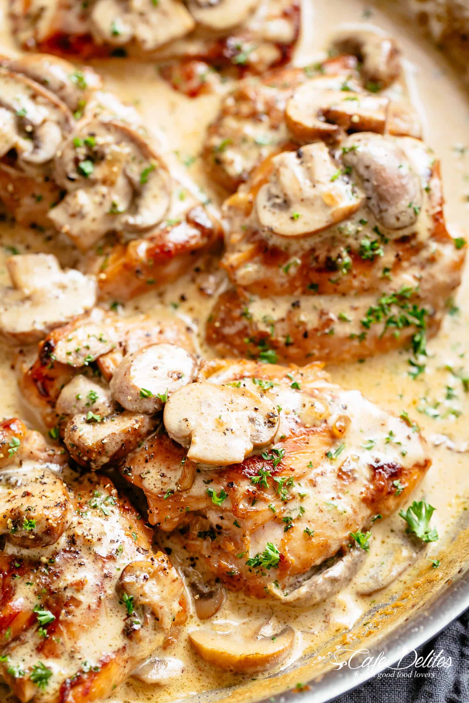 Crispy boneless chicken thighs in a thick and creamy mushroom sauce with garlic Chicken Thighs With Creamy Mushroom Garlic Sauce