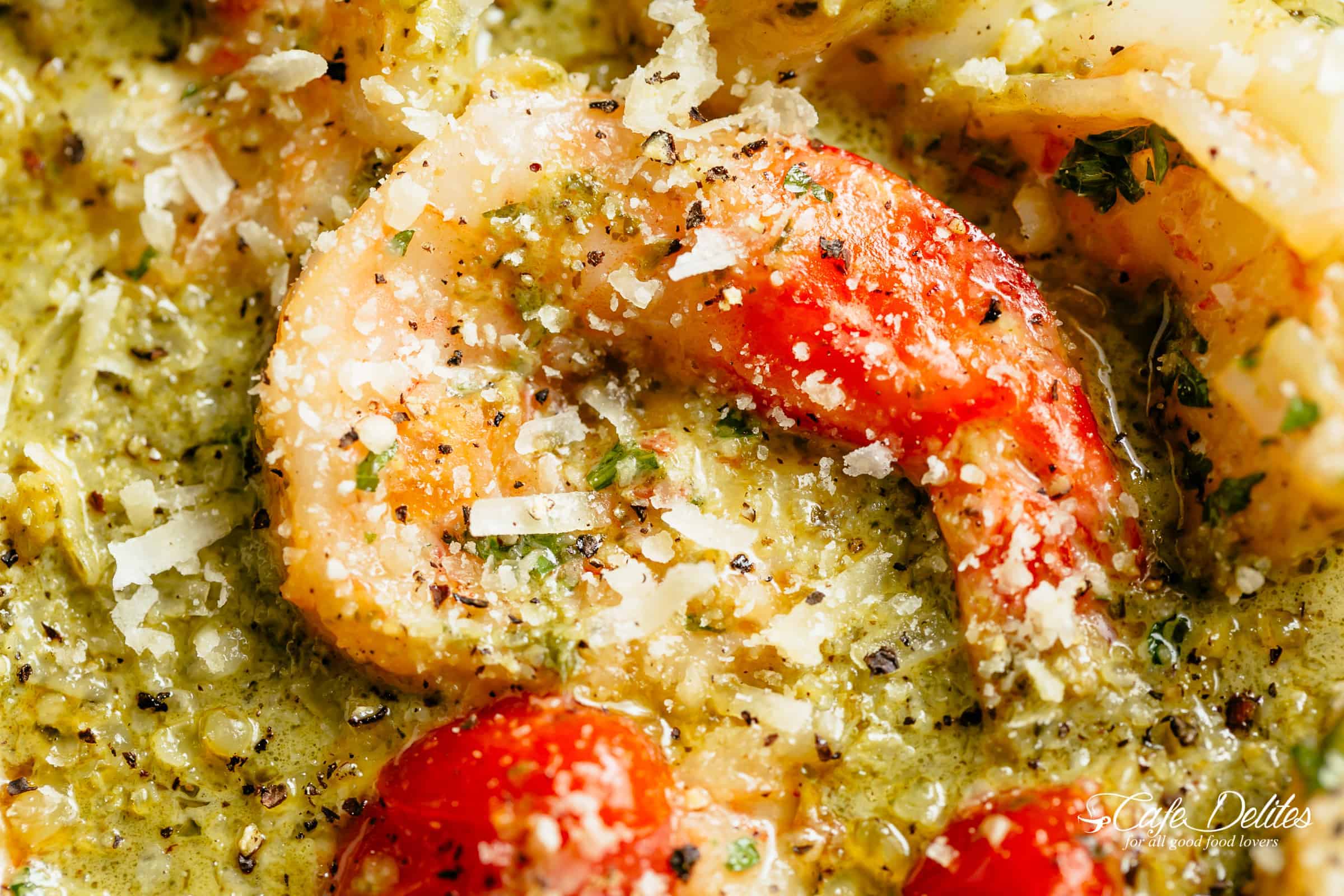 Creamy Pesto Shrimp Alfredo with parmesan cheese and blistered tomatoes | cafedelites.com