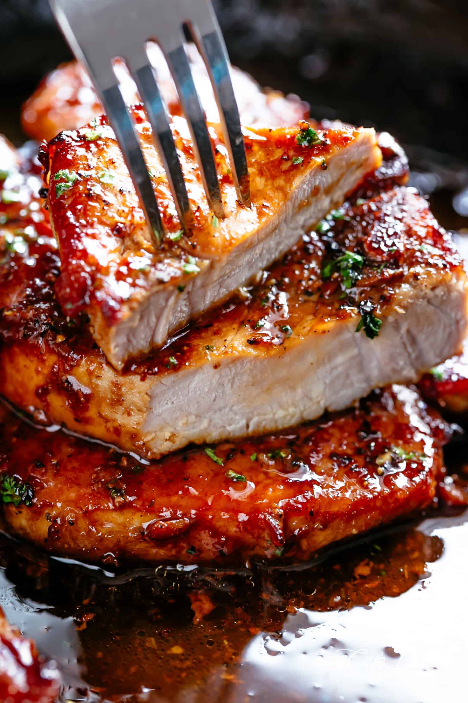 Easy Honey Garlic Pork Chops made simple, with the most amazing and addictive 4-ingredient honey garlic sauce that is so good you’ll want it on everything! | cafedelites.com
