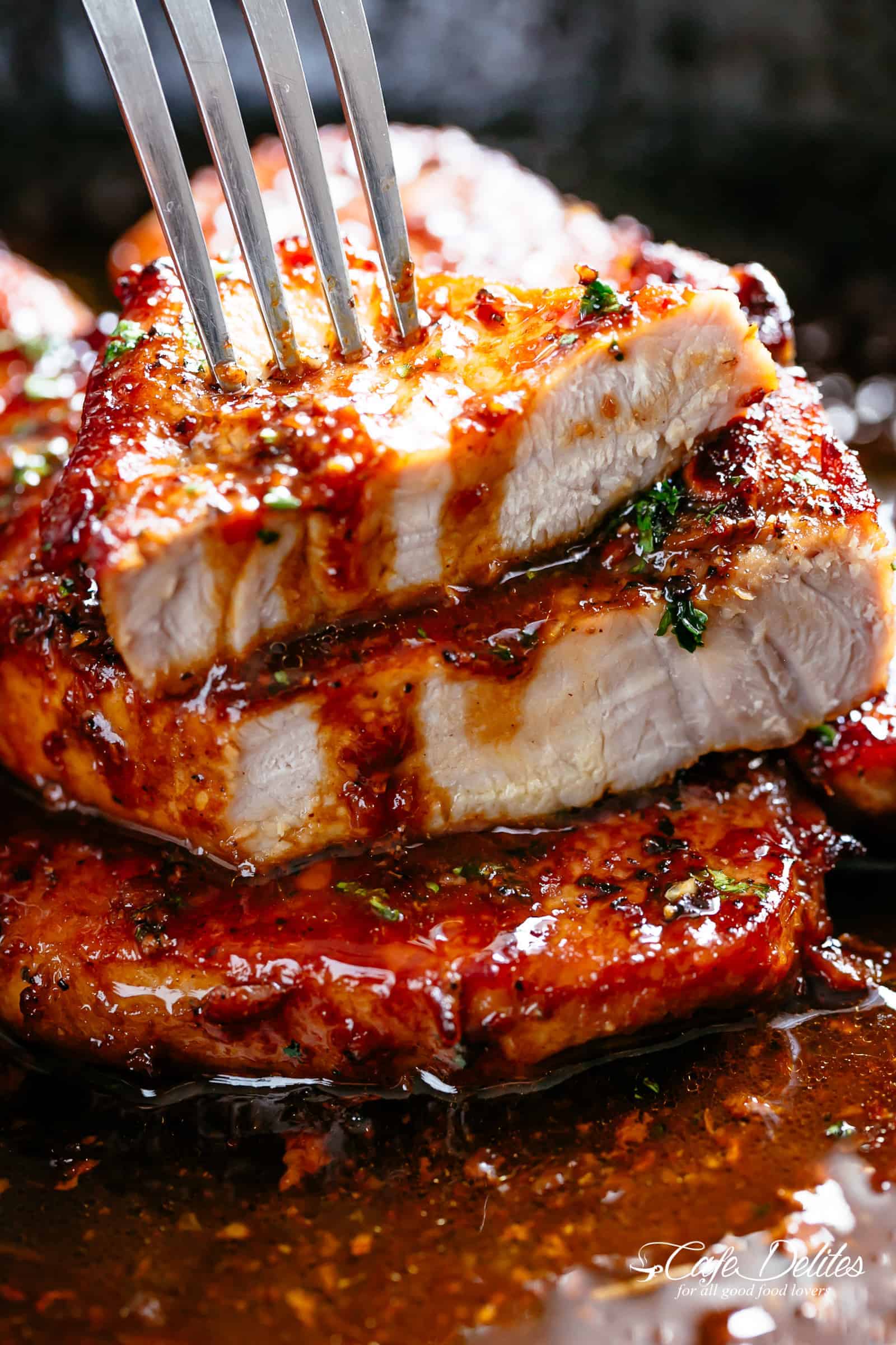 Easy Honey Garlic Pork Chops made simple, with the most amazing and addictive 4-ingredient honey garlic sauce that is so good you’ll want it on everything! | cafedelites.com