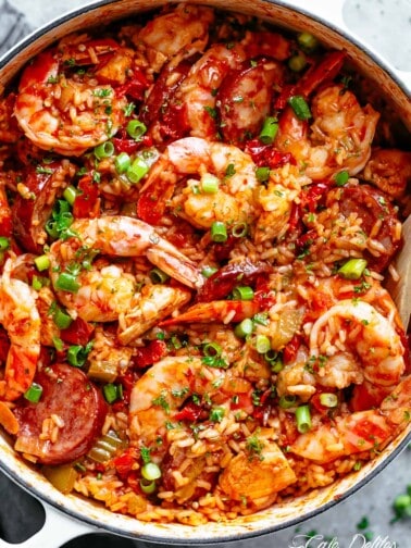 An authentic Creole Jambalaya recipe! A delicious one-pot meal coming to you from New Orleans is pure comfort food filled to the brim with chicken, shrimp, andouille sausage, rice, seasonings, spices and incredible flavours! Ready and on the table in 45 minutes!