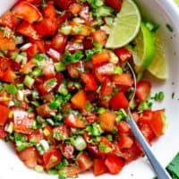 Pico De Gallo is a super easy to make fresh tomato salsa you can serve with anything! From tortilla chips to tacos, enchiladas or Carne Asada! With a handful of ingredients, this Pico De Gallo is the perfect accompaniment! Also called salsa fresca or salsa cruda! | cafedelites.com