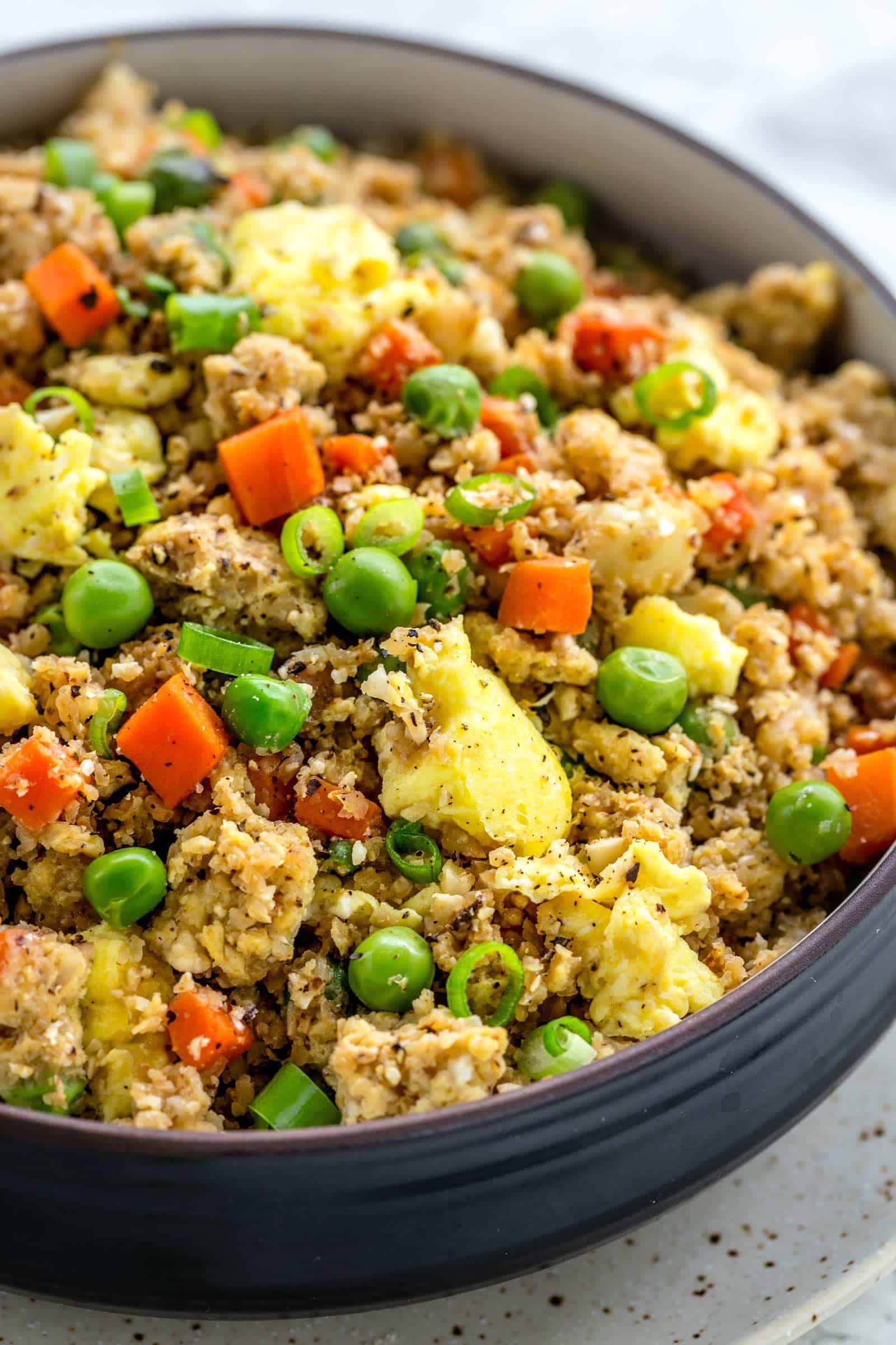 Asian bowl filled with cauliflower fried rice