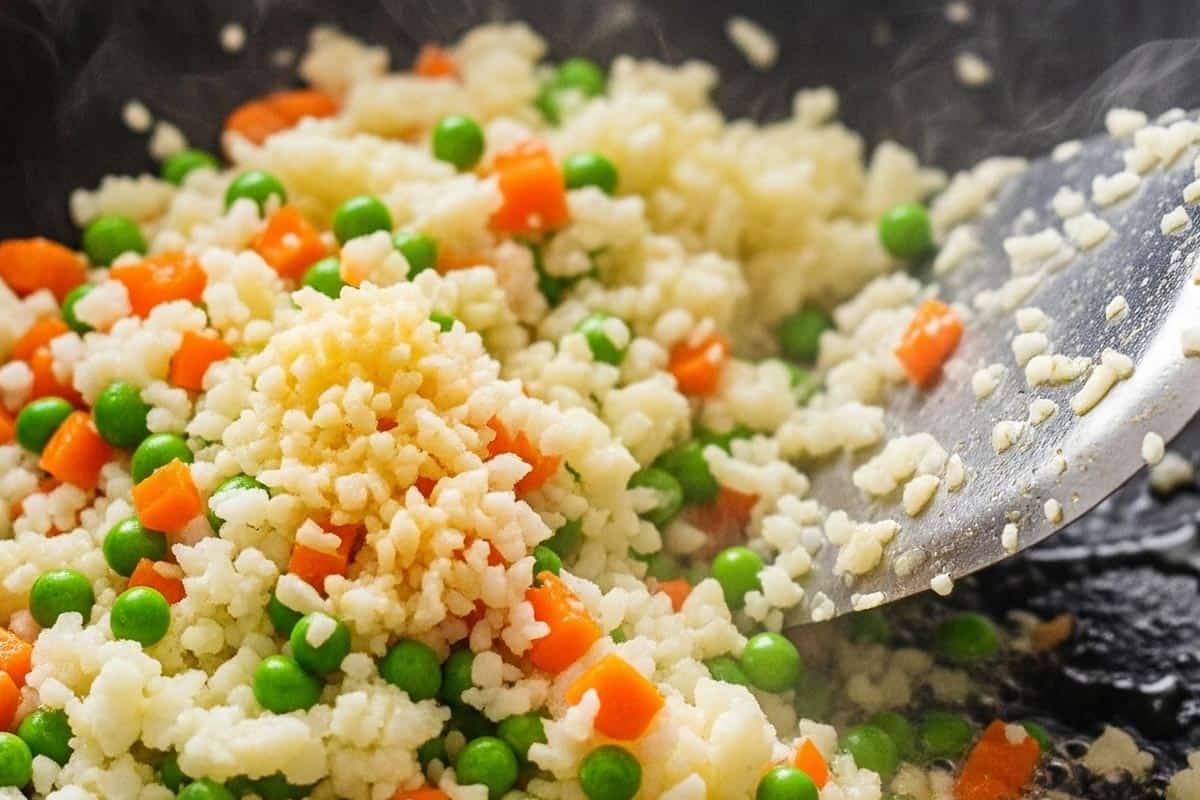 Added the riced cauliflower to the pan and stirred to combine.