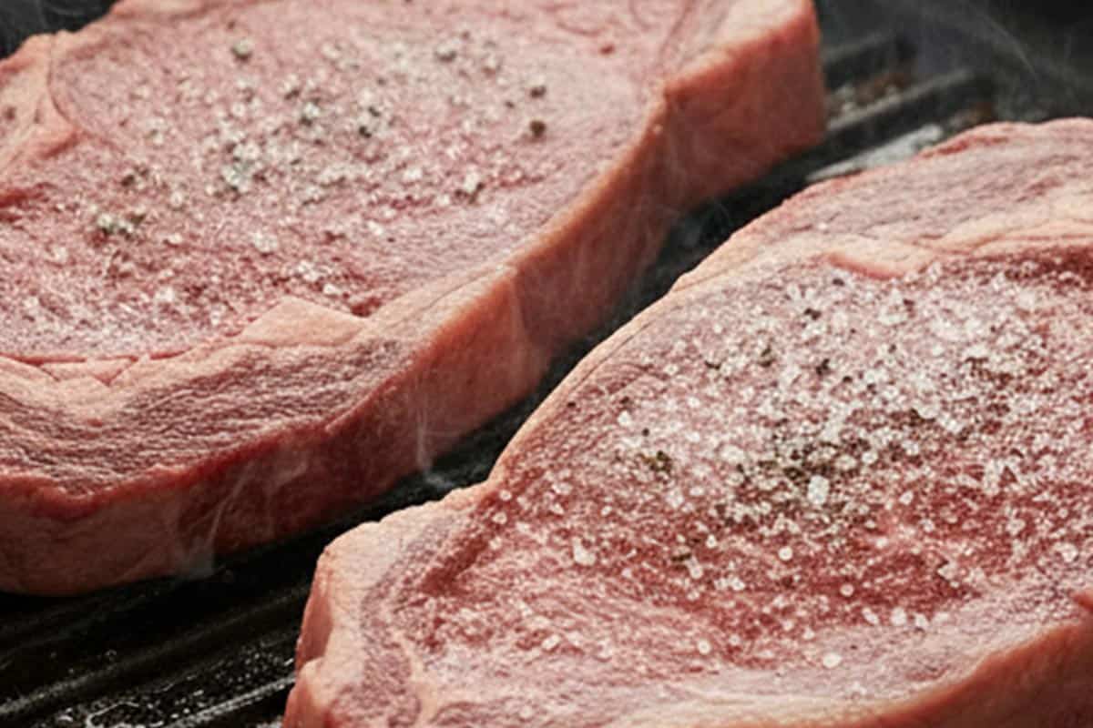 Grilling the steaks.