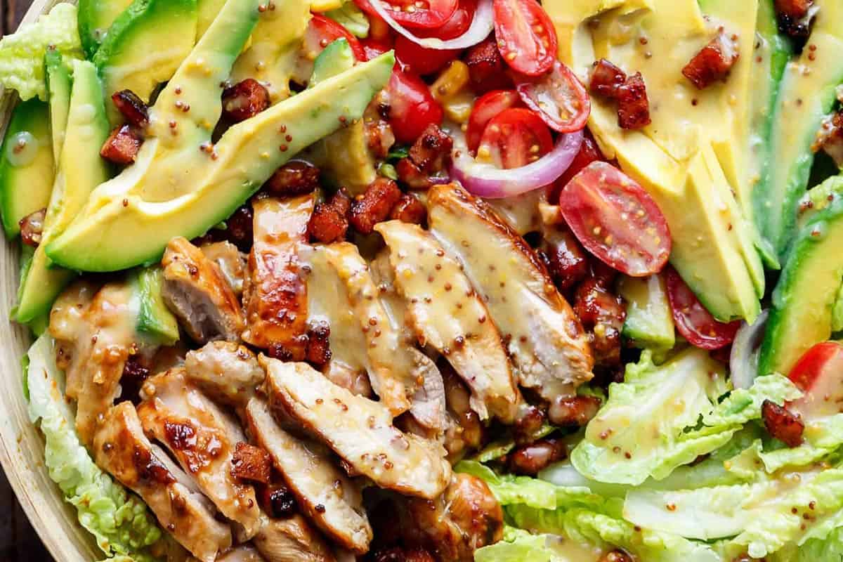 Close-up shot of Slice the rested chicken into strips.