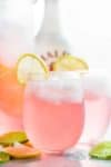 Pink Vodka Lemonade with a splash of Malibu and lime juice to get your party started! Easy to make and refreshing! | cafedelites.com