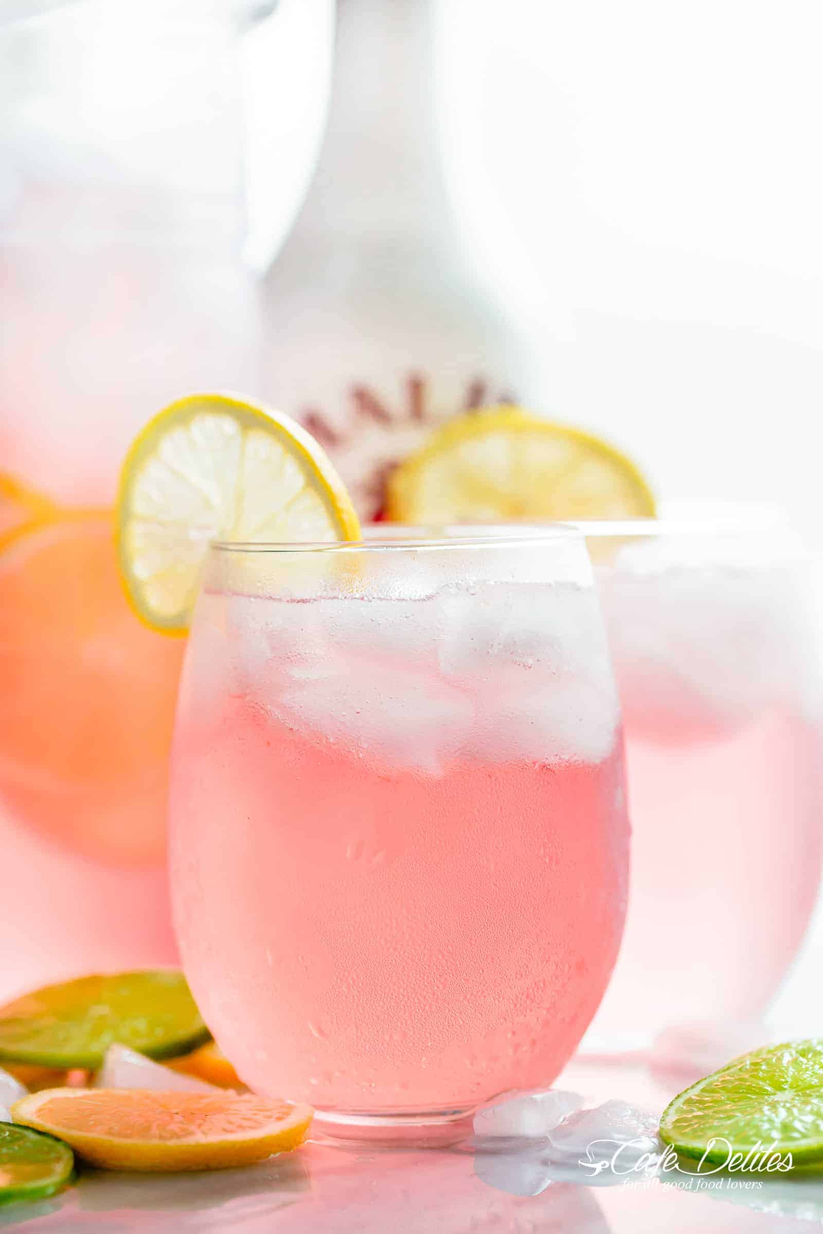 Pink Vodka Lemonade with a splash of Malibu and lime juice to get your party started! | cafedelites.com