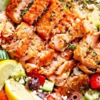 Avocado Salmon Salad with an incredible lemon herb Mediterranean dressing! Loaded with cucumber, olives, tomatoes and feta cheese! | cafedelites.com