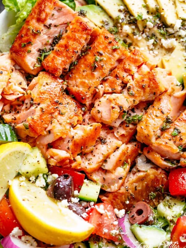 Avocado Salmon Salad with an incredible lemon herb Mediterranean dressing! Loaded with cucumber, olives, tomatoes and feta cheese in a pan