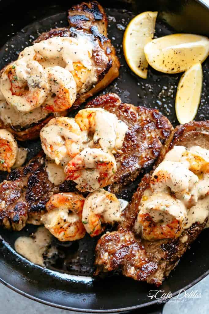 Steak And Creamy Garlic Shrimp is a fast and easy to make gourmet steak dinner! | cafedelites.com