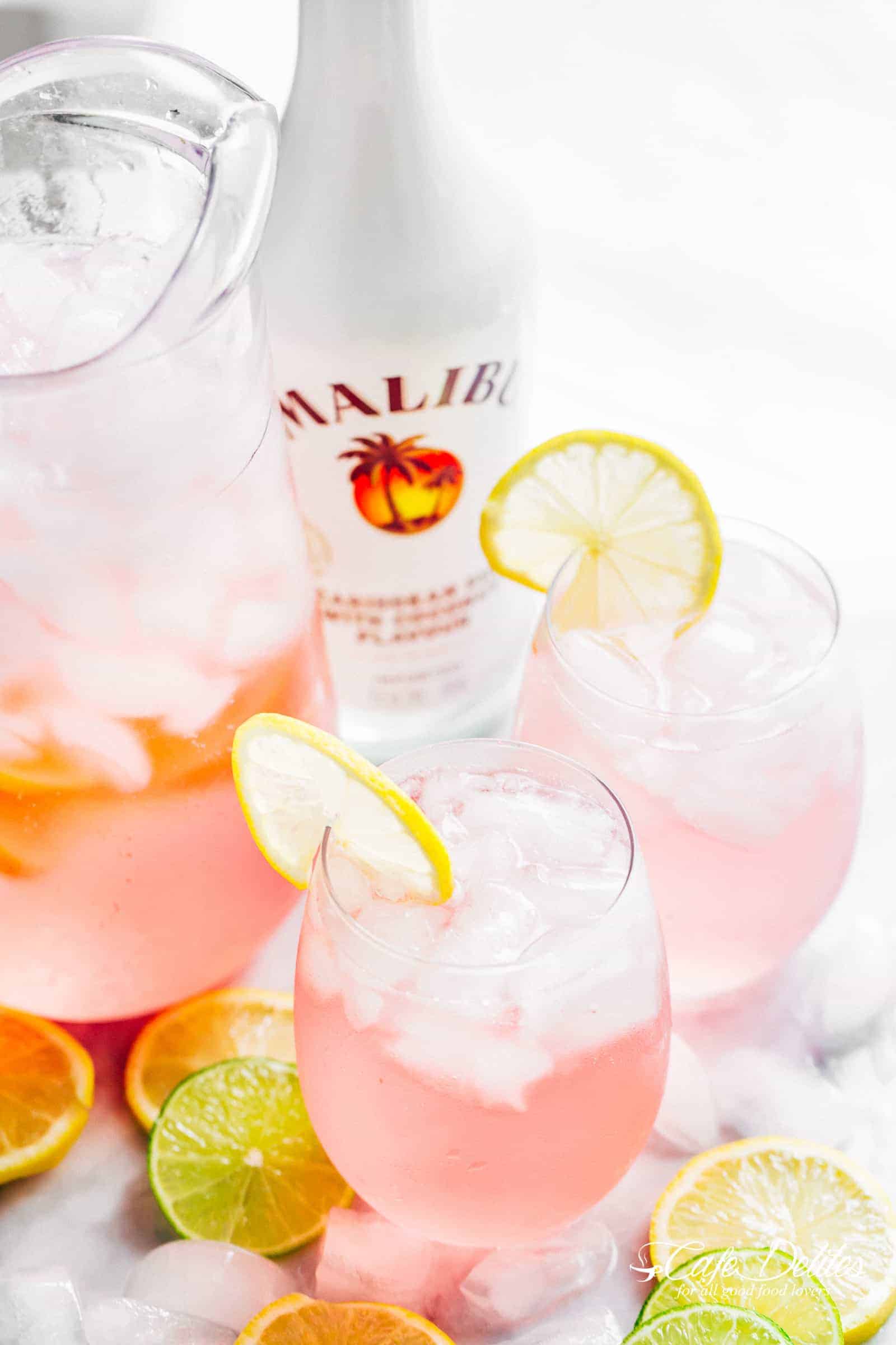 Pink Vodka Lemonade Punch or Cocktail with a splash of Malibu and lime juice to get your p Pink Vodka Lemonade (Pitcher )