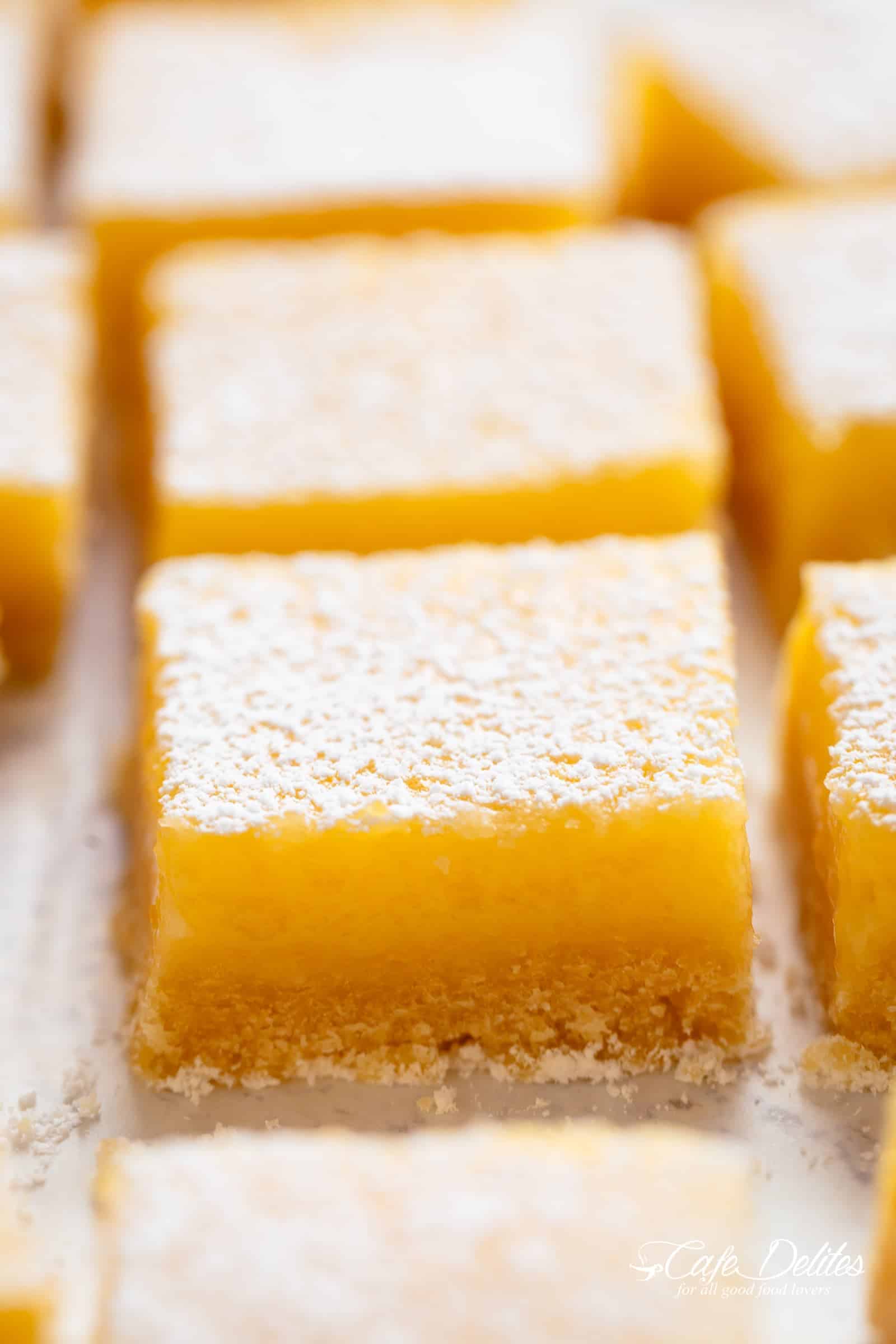 101 calorie Lightened Up Lemon Bars are the perfect dessert and taste so sinful without the guilt! You won't believe they're lightened up! | https://cafedelites.com