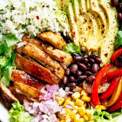 Fajita Chicken Burrito Bowl is packed with juicy golden chicken, cilantro lime rice, avocado and a delicious dressing