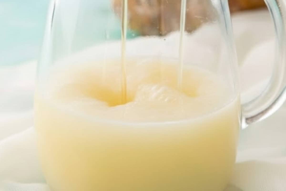 Add the pineapple coconut juice, rum, and lime juice to a small pitcher. Stir until combined and refrigerate. - 3