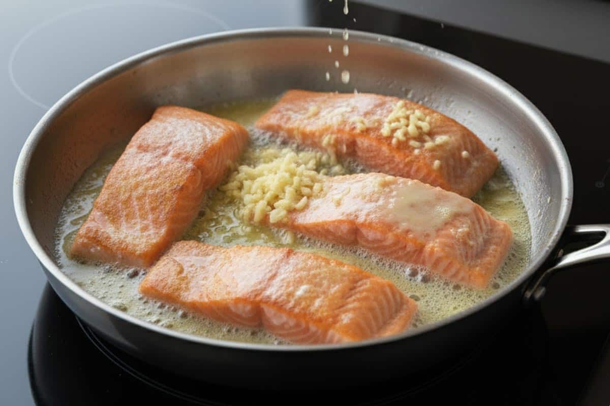 Added butter, chopped garlic, and the remaining lemon juice to the pan.