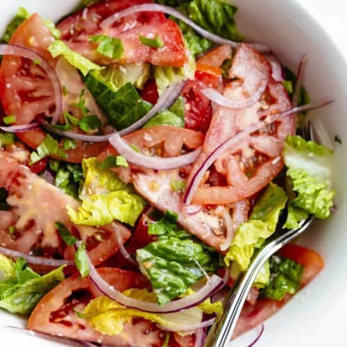 Easy Tomato Salad drizzled with a Lemon Parmesan Vinaigrette is one of the best Easy Tomato Salad