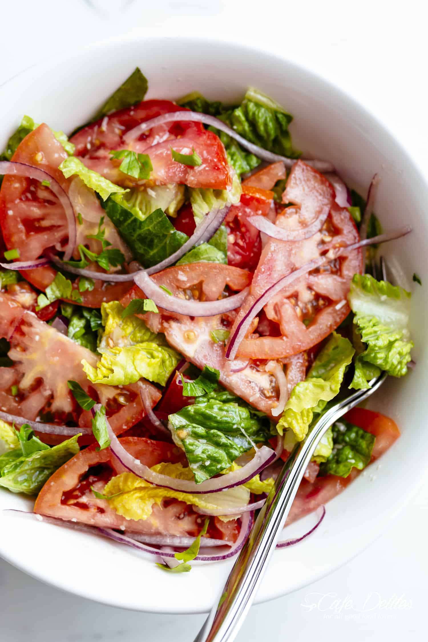 Easy Tomato Salad drizzled with a Lemon Parmesan Vinaigrette is one of the best Easy Tomato Salad