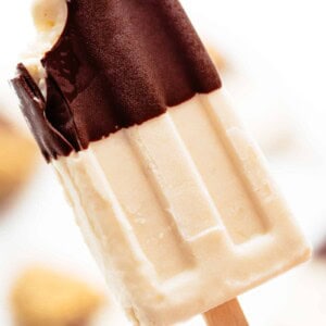 A bite taken from Chocolate-Covered-Banana-Popsicles