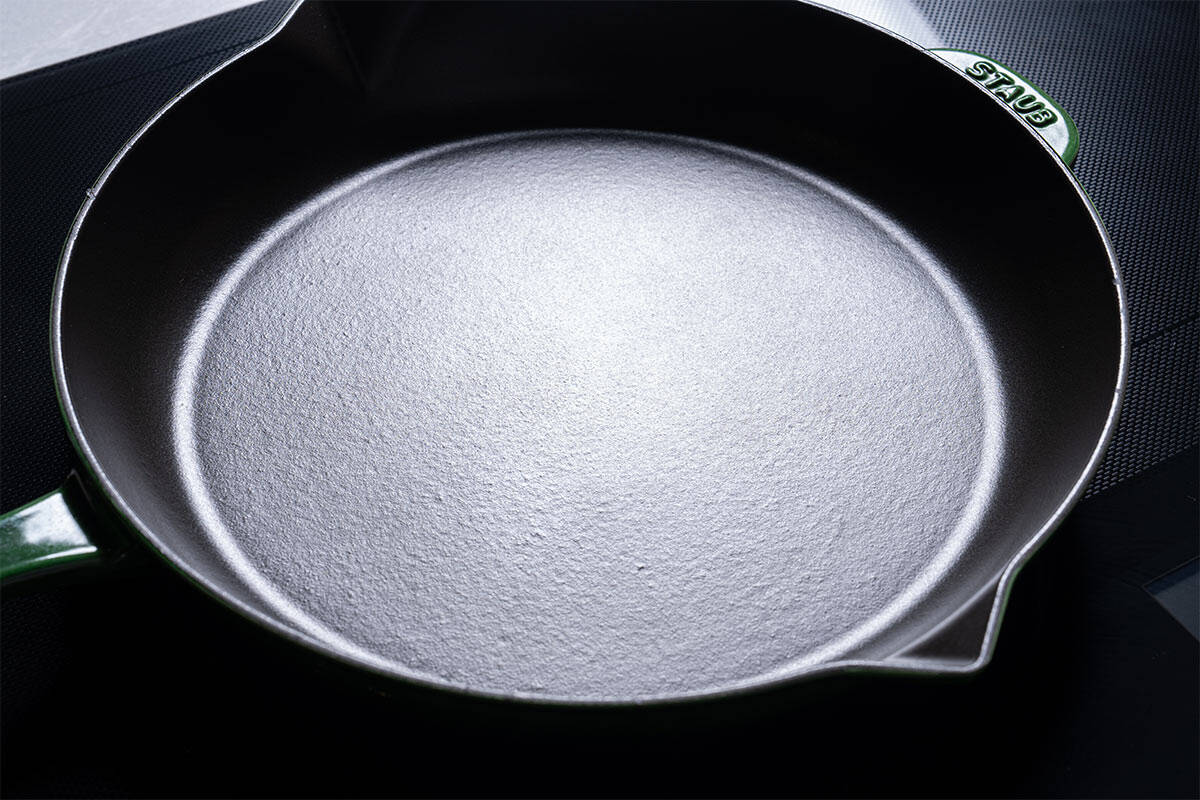 Image of a skillet being heated over medium-high heat.