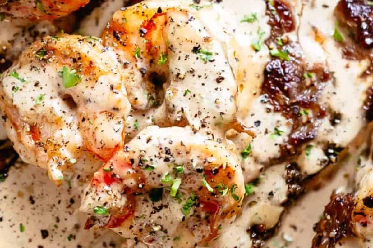 Return shrimp to the pan and stir in parsley until coated. Serve the creamy garlic shrimp over or beside the steaks.