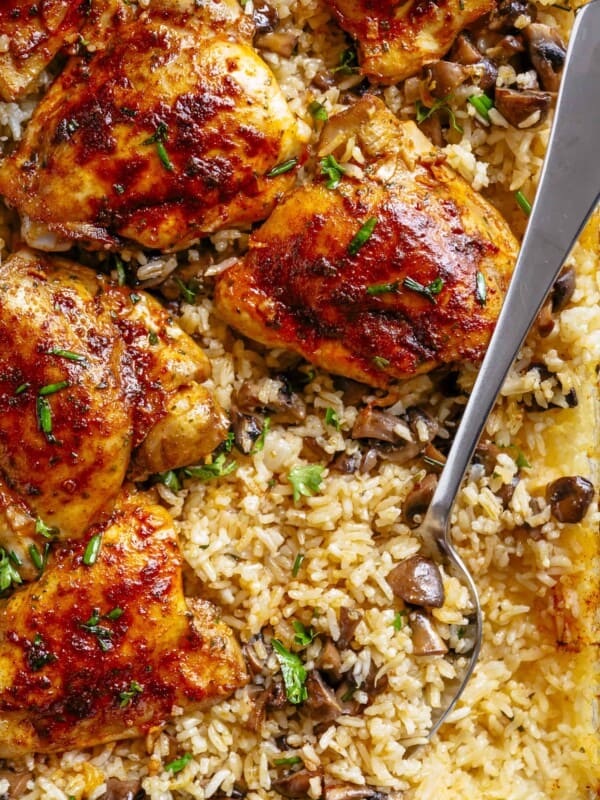 Oven Baked Chicken And Rice With Garlic Butter Mushrooms mixed through is winner of a chicken dinner!