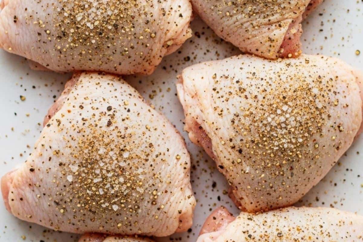 pat and dry the chicken thighs and season both sides with salt, pepper and garlic powder
