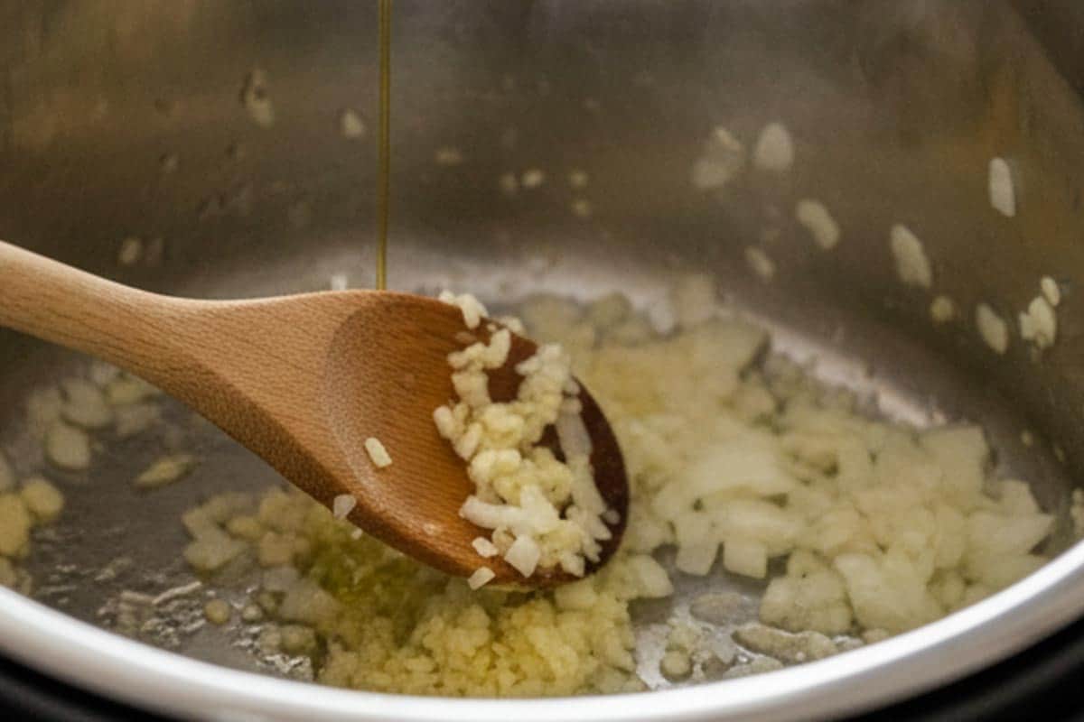 Added the olive oil, then garlic and onion.