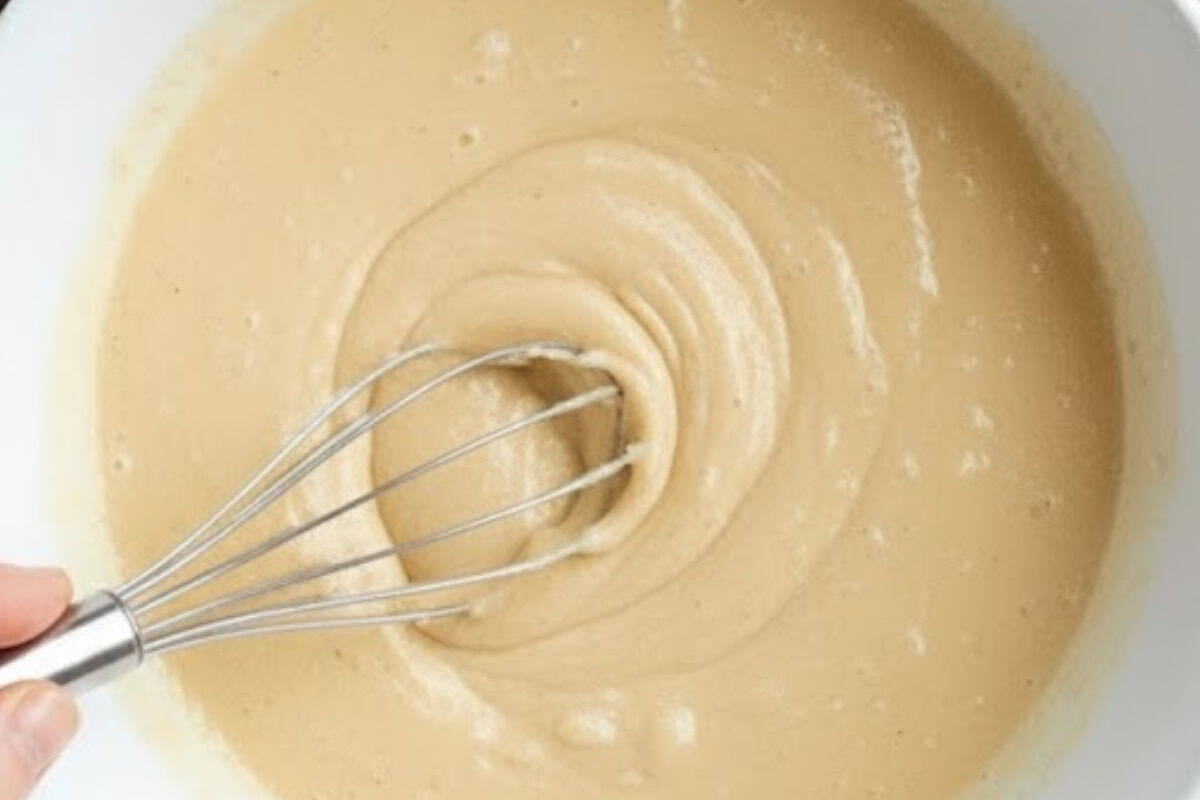 Make a well in the center and pour in the oil, egg, vanilla, and milk.