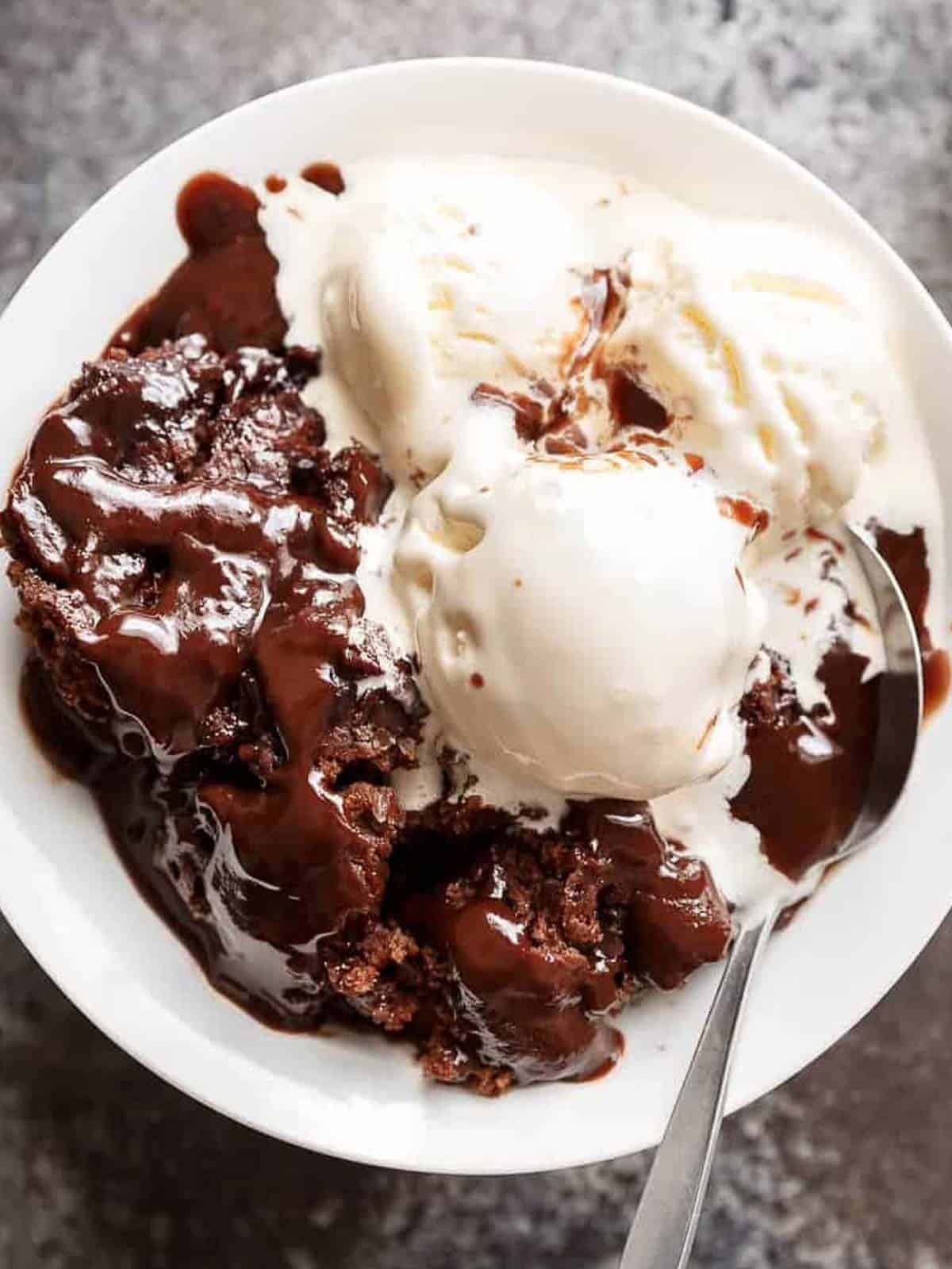 hot fudge chocolate pudding cake with ice cream scoops