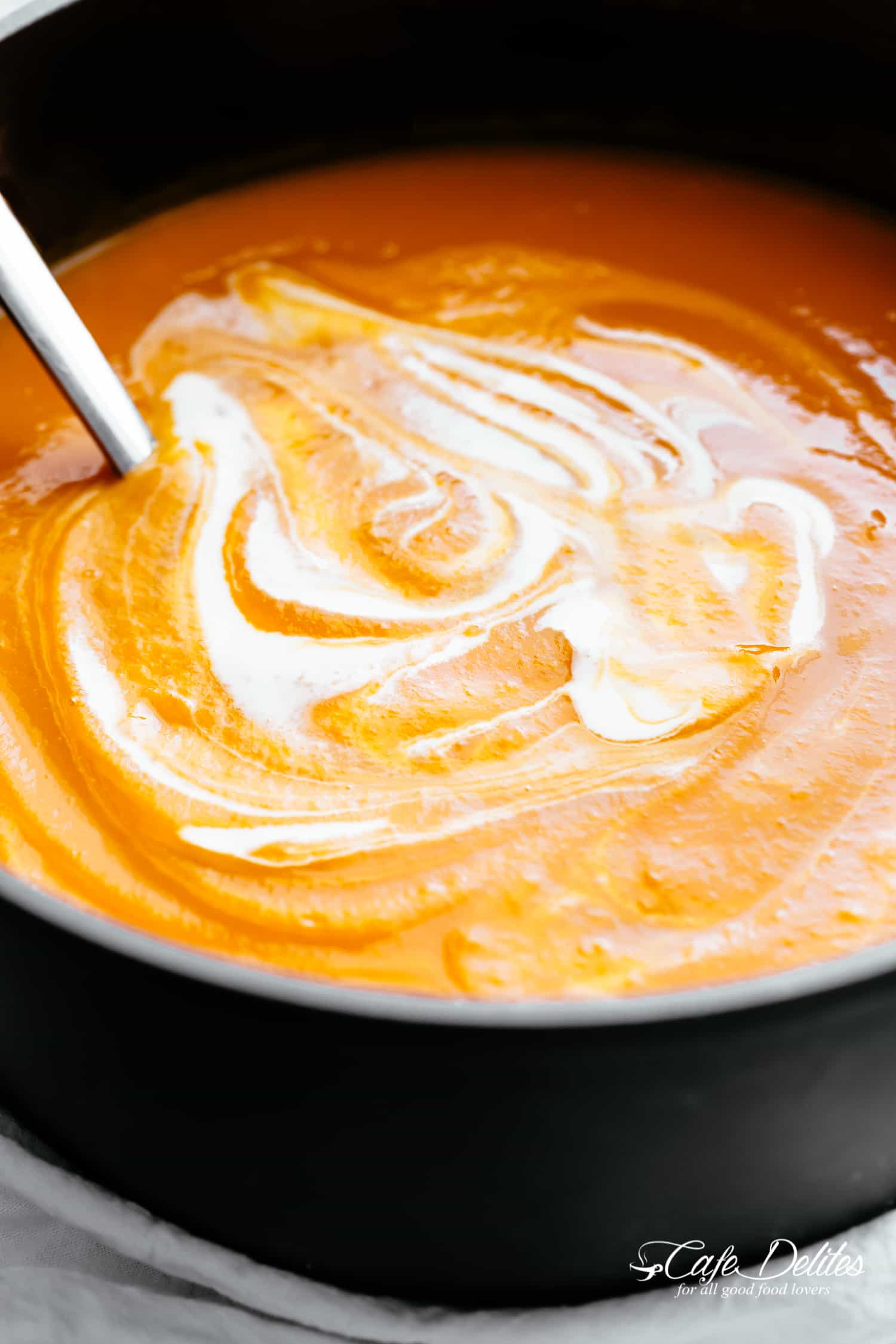 Deliciously easy Butternut Squash Soup is so rich in butternut flavour. Naturally thick and creamy, perfect for the season and always a hit! This recipe is perfect for when you're craving homemade butternut squash soup. | cafedelites.com