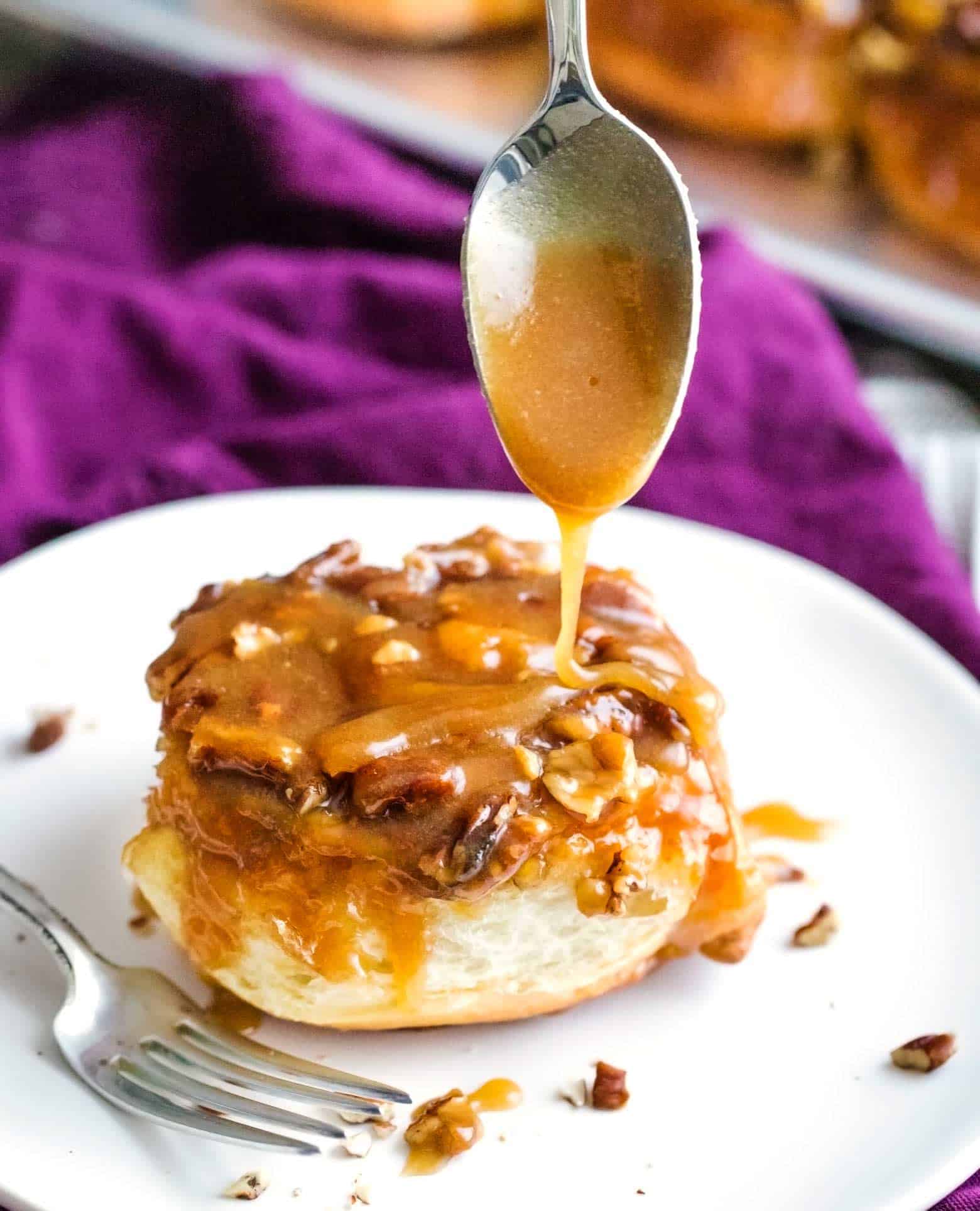 These maple pecan sticky buns perfect a cold morning or for a holiday breakfast. Soft, sweet and sticky, these buns are so much fun to make! | cafedelites.com