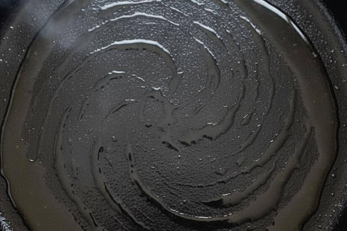 Heating the pan with oil.