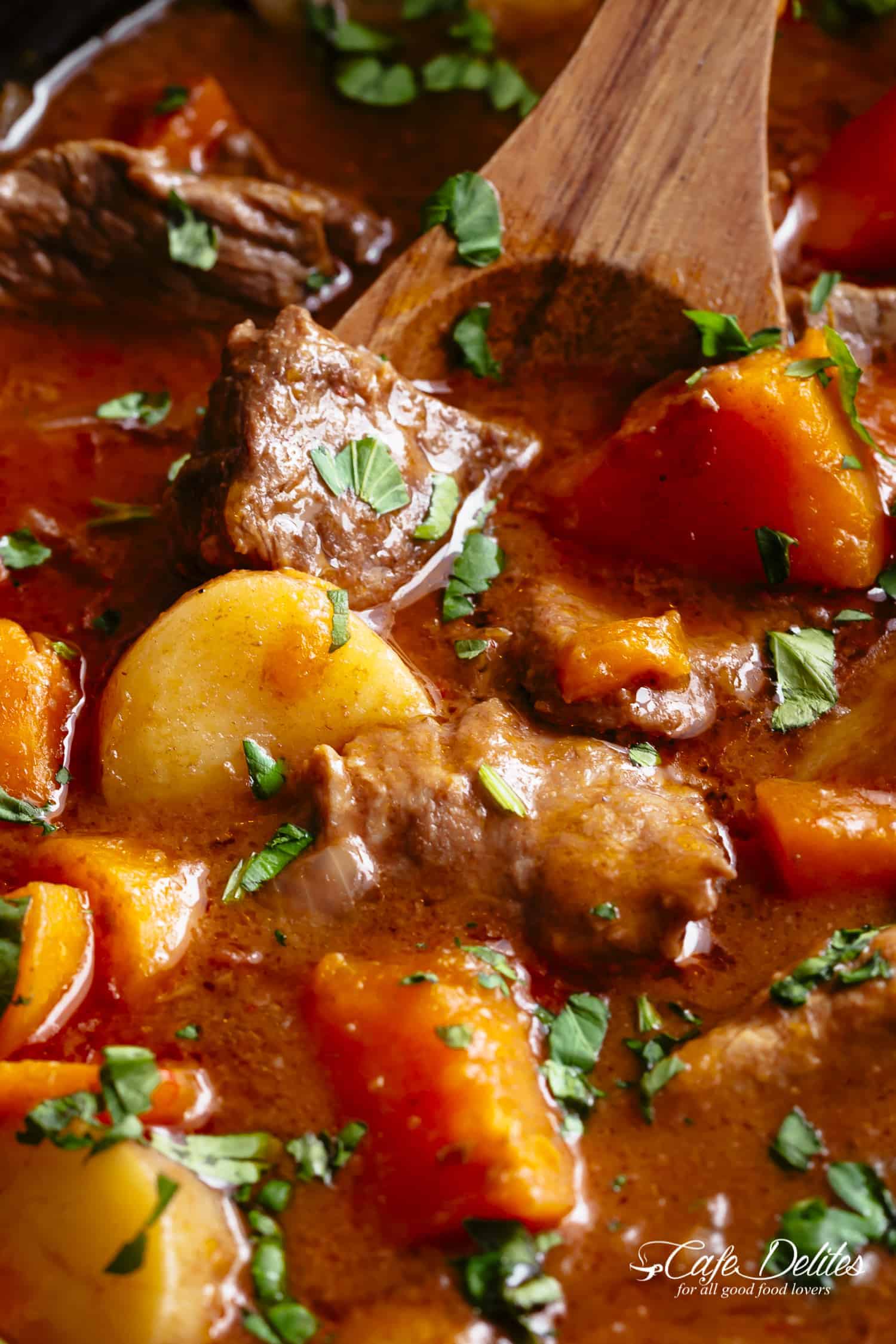 Slow Cooker Beef Stew is easy to throw together and filled with fall apart, tender beef pieces and sweet potato! | https://cafedelites.com