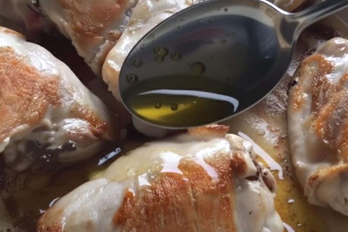 Removing excess fat from the pan.