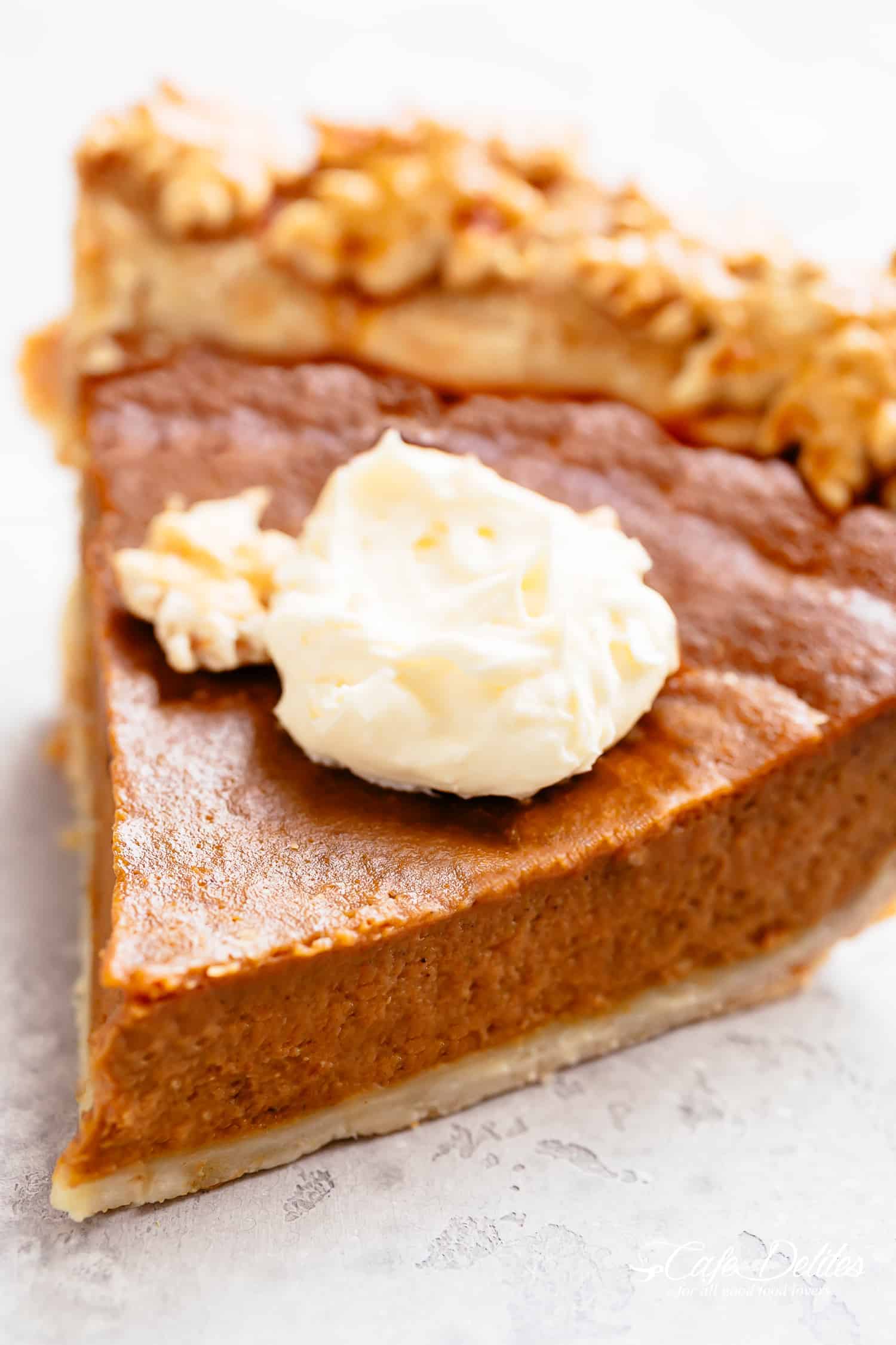 A slice of Pumpkin Pie with whipped cream!