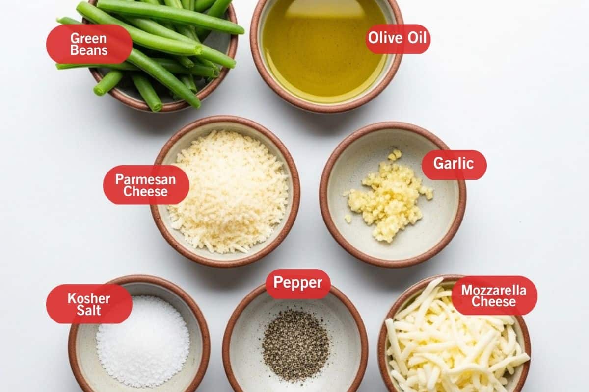 Flat lay photo of ingredient shot of green beans, olive oil. parmesan cheese, garlic, kosher salt, pepper mozzarella cheese