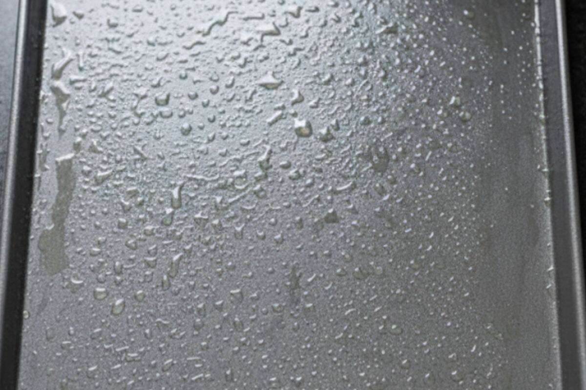 Lightly grease a large baking sheet with cooking oil spray.