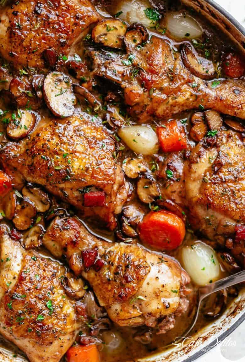 Coq Au Vin, or chicken in wine, is a popular classic French Chicken Stew made easy with crispy chicken pieces!