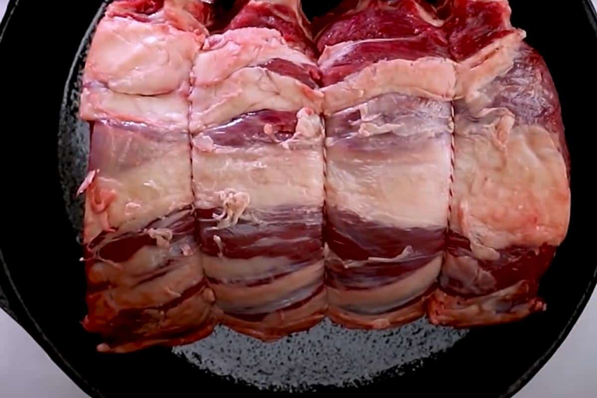 Rib roast in a pan.
