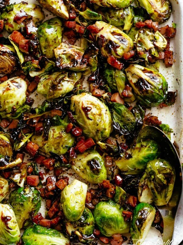 Garlic Roasted Brussels Sprouts with crispy bacon or pancetta, finished off with a balsamic reduction.