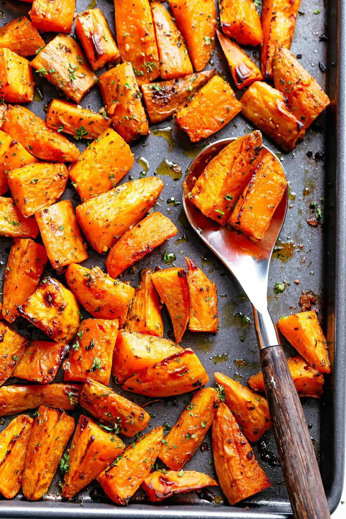 Roasted sweet potatoes in a baking tray